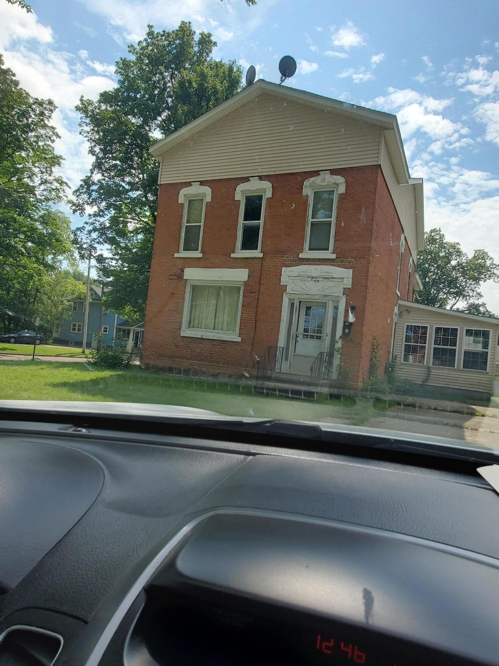 203 W Ash St, Albion, MI 49224 - view of front of property featuring brick siding