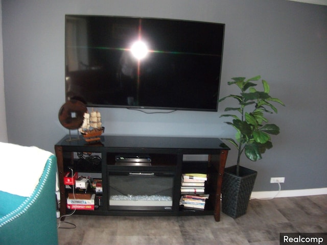 interior details featuring hardwood / wood-style flooring