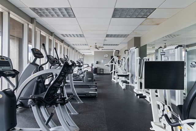 exercise room with ceiling fan