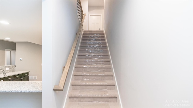 45 Gallery Pointe Dr, Saline, MI 48176 - stairs featuring recessed lighting and baseboards