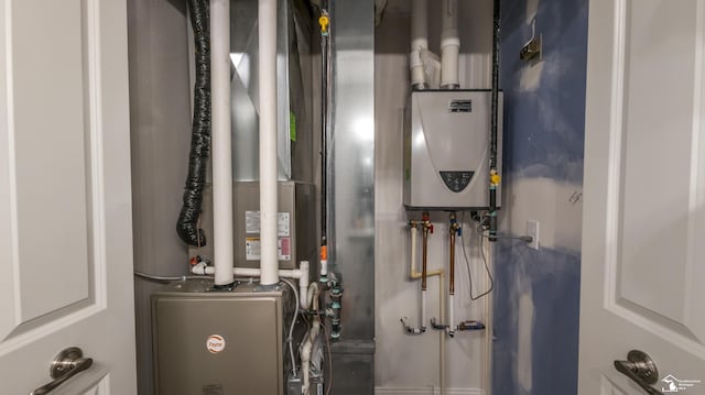 utility room with water heater