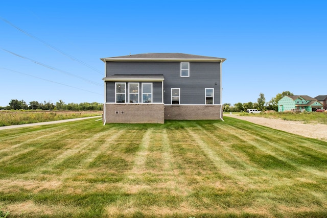 13327 Demil Dr, Romeo, MI 48065 - back of property with a yard and brick siding