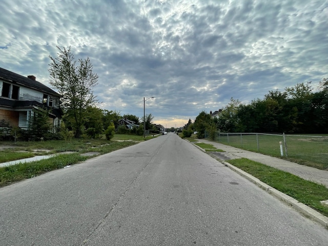 3240 Glynn, Detroit, MI 48206 - view of asphalt road with sidewalks and street lighting