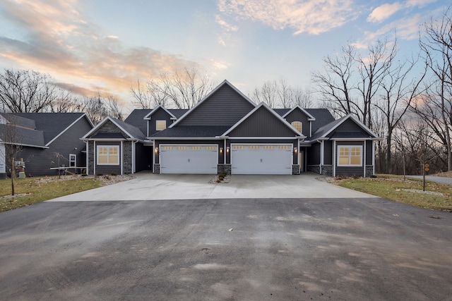 craftsman inspired home featuring a garage