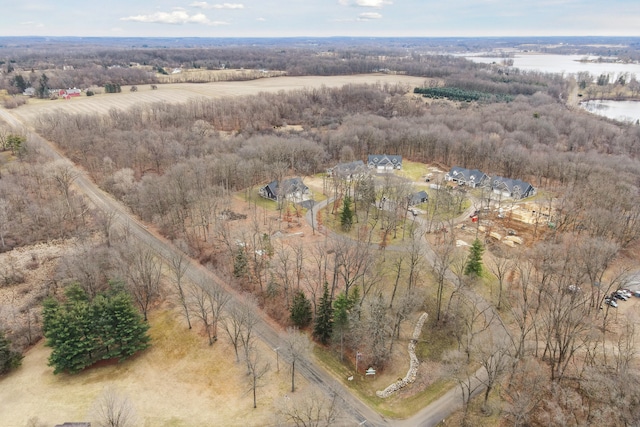 aerial view featuring a rural view and a water view