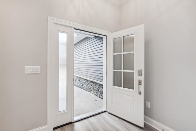 entryway with light wood-type flooring