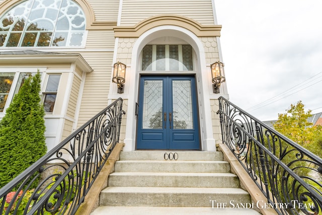 entrance to property featuring french doors