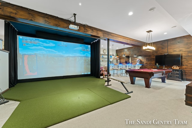 recreation room with wood walls, carpet, golf simulator, and pool table