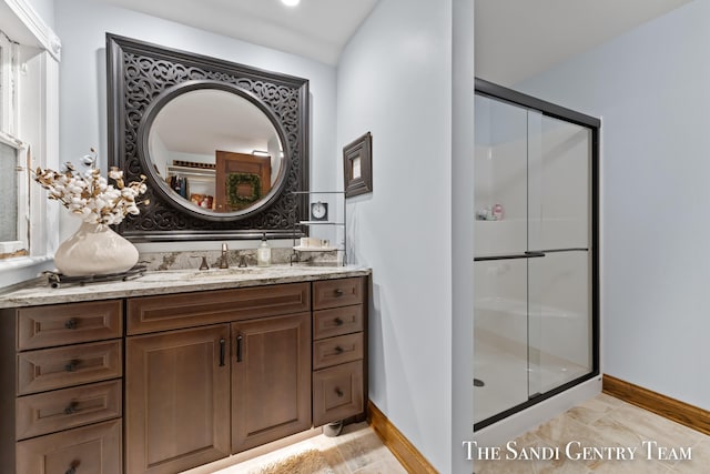 bathroom featuring vanity and walk in shower