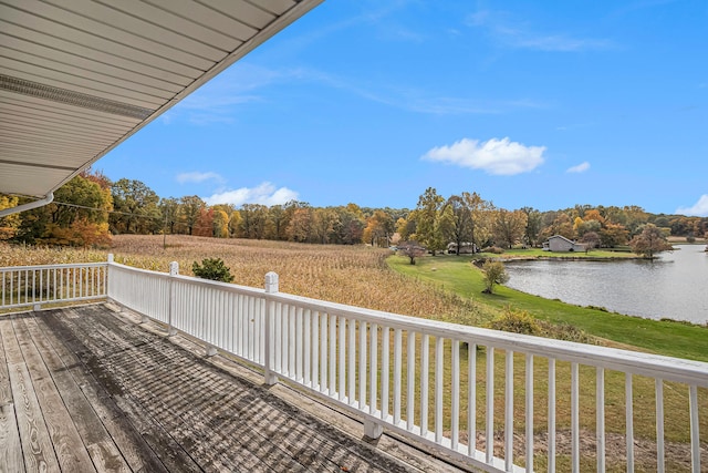 wooden deck featuring a water view