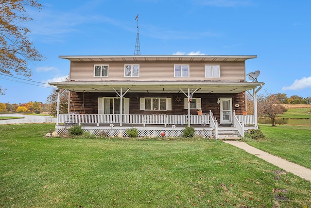 view of front of house featuring a front lawn and a porch