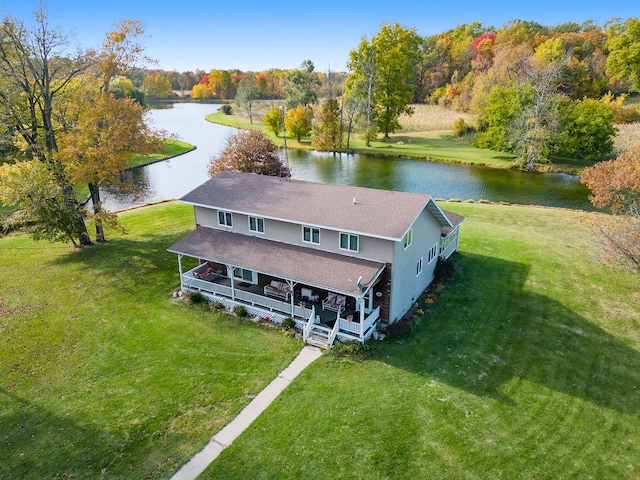 bird's eye view with a water view