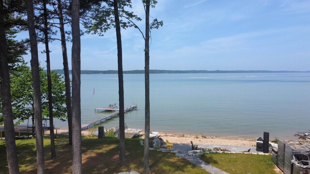 9554 Fowler Ln, Rapid City, MI 49676 - water view featuring a boat dock