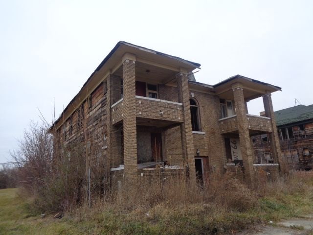 3758 Rochester St, Detroit, MI 48206 - rear view of house with a balcony and brick siding