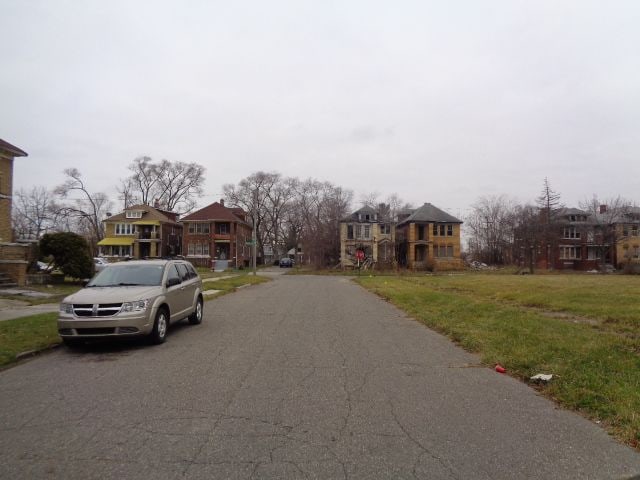 3758 Rochester St, Detroit, MI 48206 - view of asphalt road with a residential view