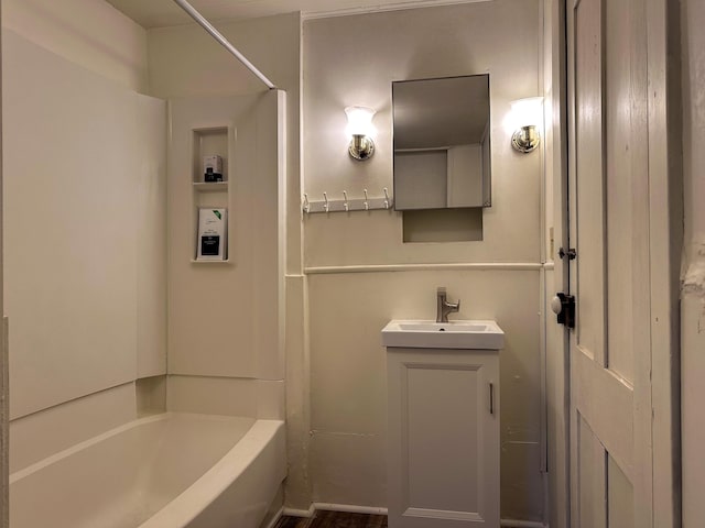 415 S Franklin, Mount Pleasant, MI 48858 - bathroom with vanity and washtub / shower combination