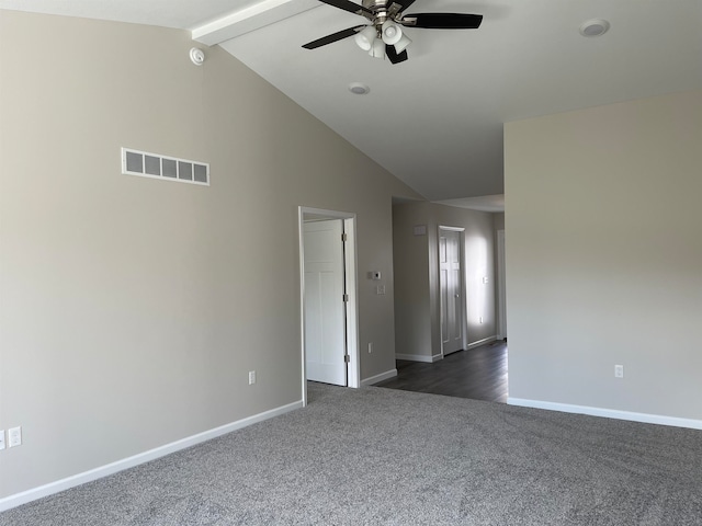 carpeted empty room with vaulted ceiling with beams and ceiling fan