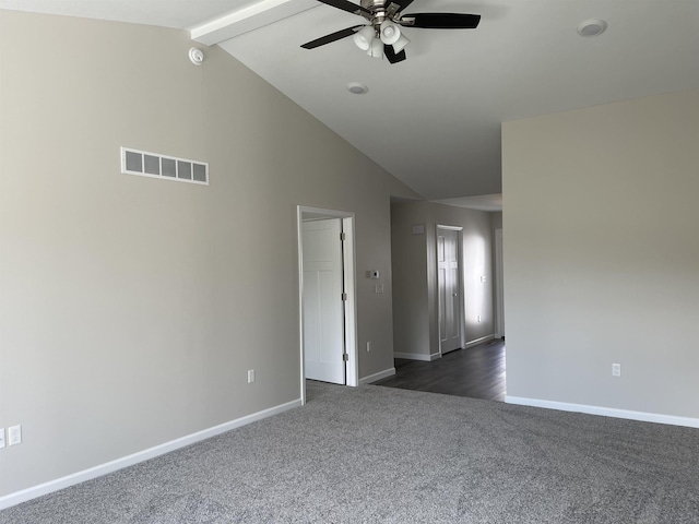 260 Windemere Pl, West Branch, MI 48661 - empty room with dark colored carpet, a ceiling fan, baseboards, beamed ceiling, and high vaulted ceiling