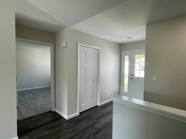 entryway with dark wood-type flooring