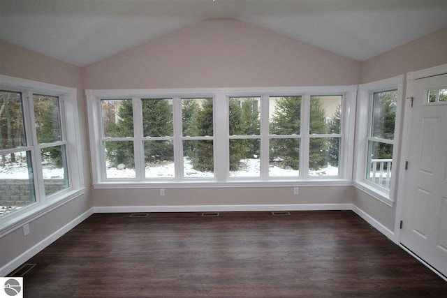 00 Sockeye Dr, Farwell, MI 48622 - unfurnished sunroom with lofted ceiling, wood finished floors, healthy amount of natural light, and baseboards