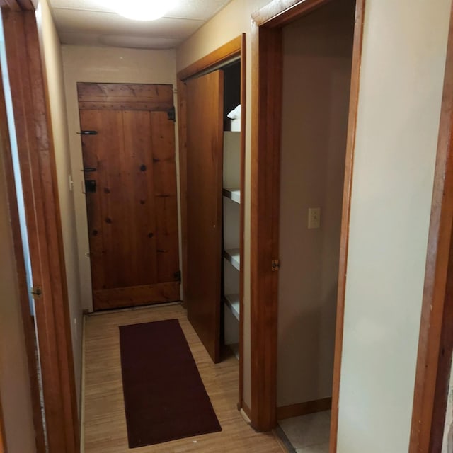 1400 Rainbow Park Trl, Luzerne, MI 48647 - hall featuring baseboards and light wood-style flooring