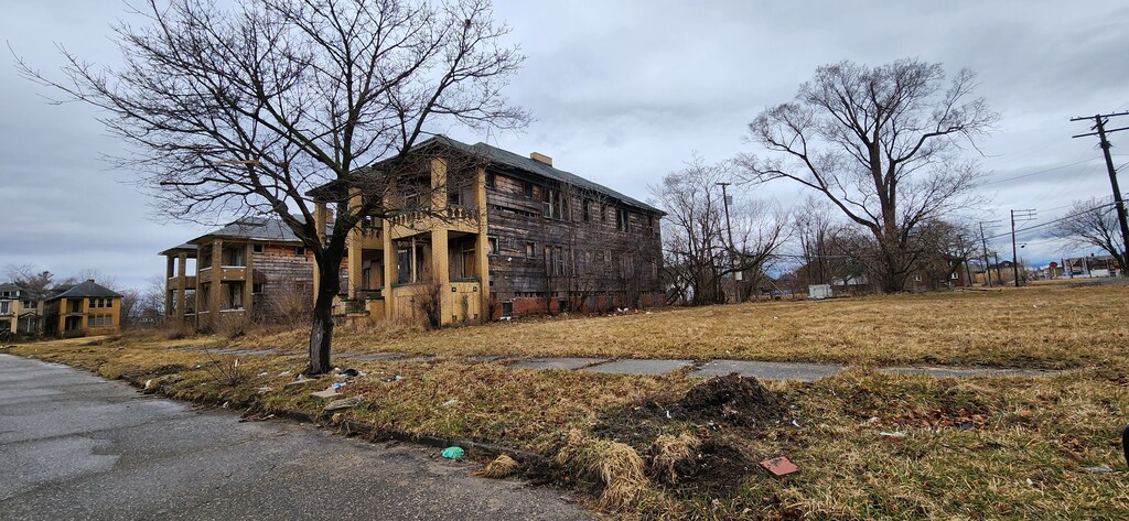 3740 Rochester St, Detroit, MI 48206 - view of home's exterior featuring a chimney