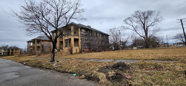 3740 Rochester St, Detroit, MI 48206 - view of home's exterior featuring a chimney