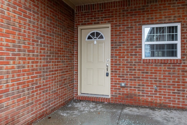 176 Sea Breeze Dr Unit 6, Detroit, MI 48214 - view of exterior entry with brick siding