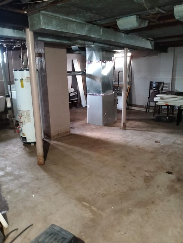 basement with heating unit and water heater