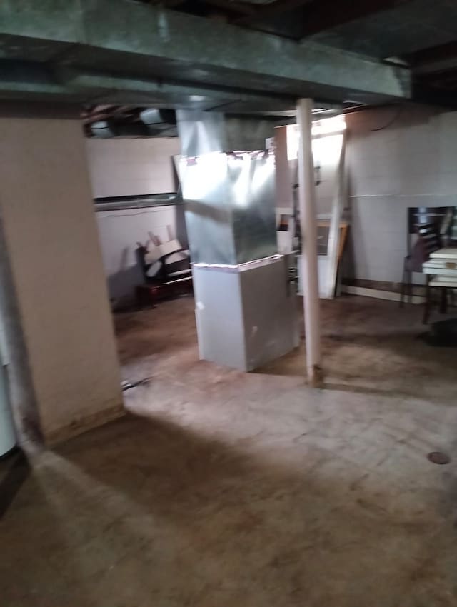 basement featuring heating unit