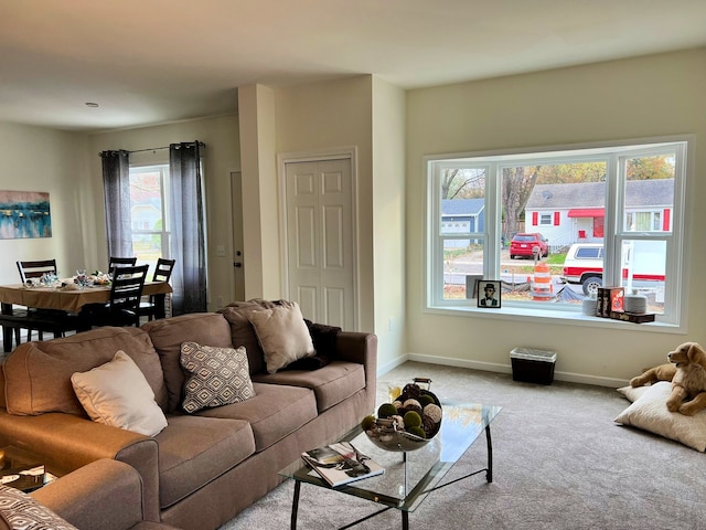 living room with light colored carpet