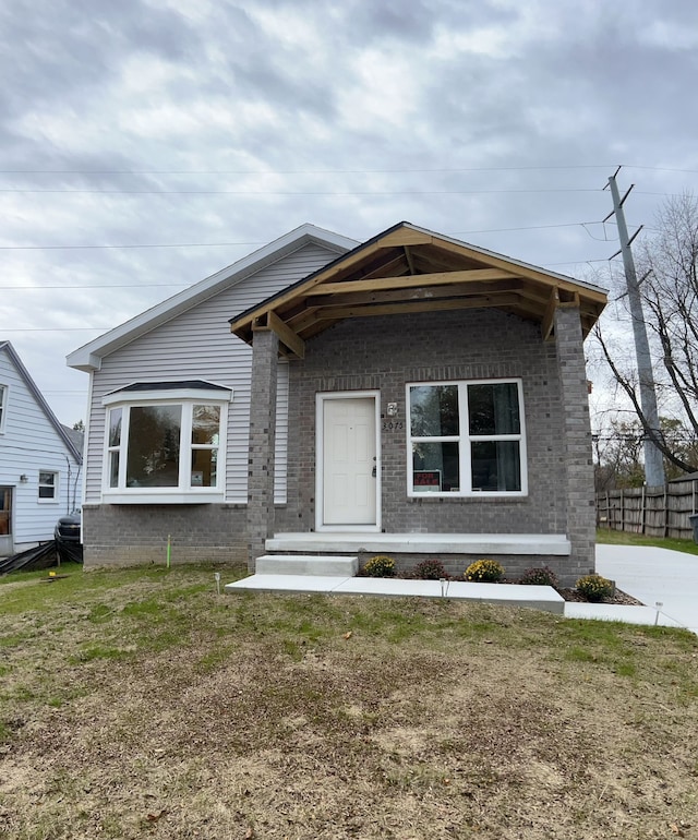 3075 Waukegan St, Auburn Hills, MI 48326 - view of front of home featuring brick siding