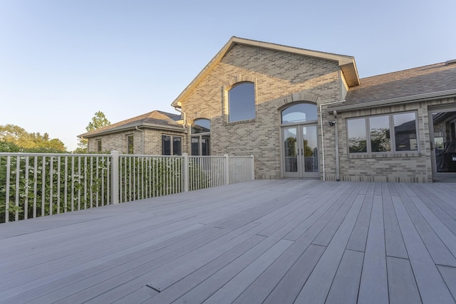 wooden terrace featuring french doors