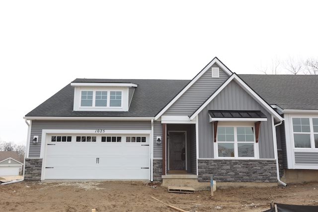 craftsman inspired home featuring a garage