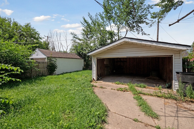 garage with a lawn