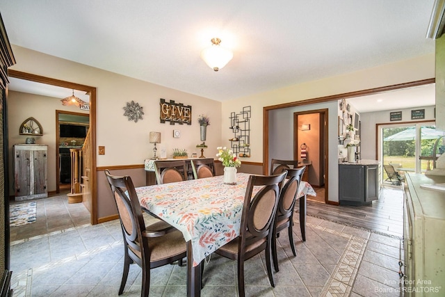 dining space featuring light hardwood / wood-style floors