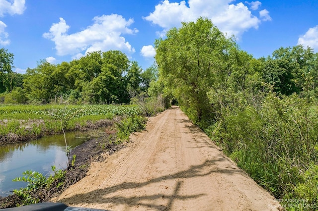 view of street with a water view