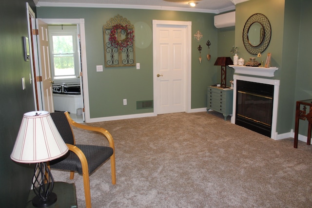 sitting room with light carpet, a wall unit AC, and ornamental molding