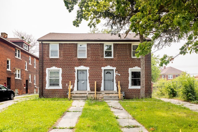 view of front facade with a front yard