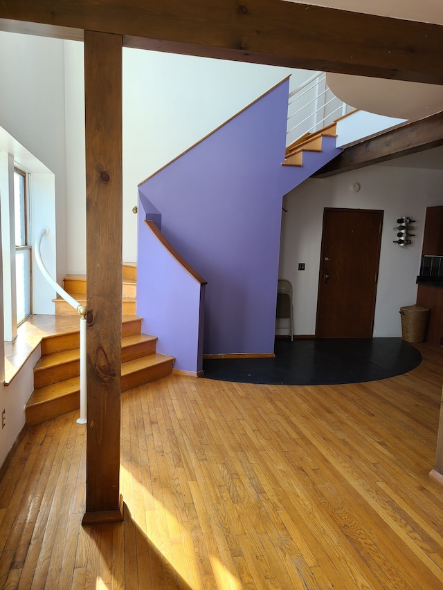 677 Selden St, Detroit, MI 48201 - staircase with wood-type flooring