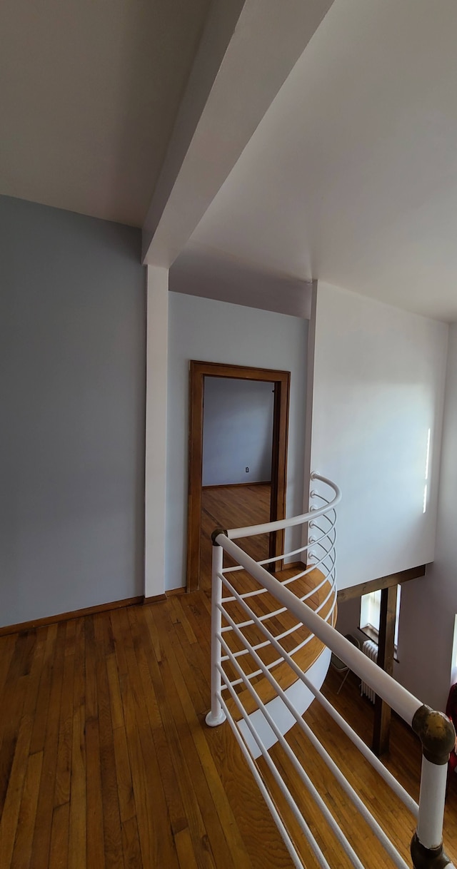 677 Selden St, Detroit, MI 48201 - staircase featuring hardwood / wood-style flooring