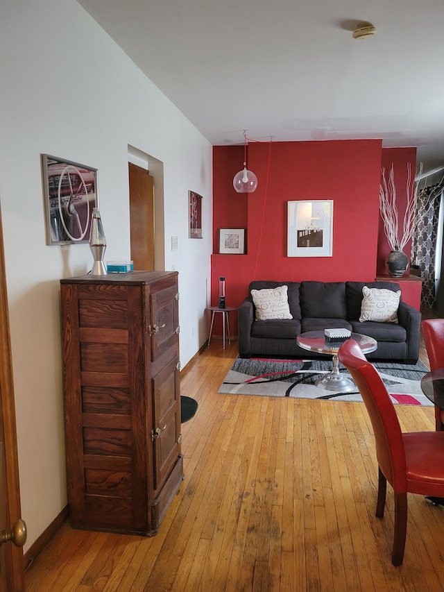 living room with light hardwood / wood-style floors