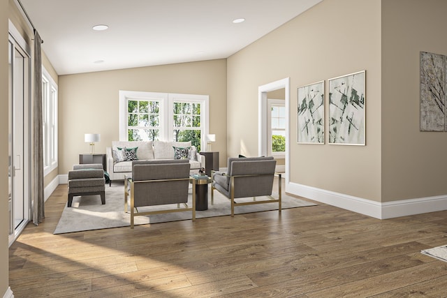 1111 Angara Dr Unit 1, Rochester Hills, MI 48309 - sitting room with lofted ceiling, wood-type flooring, baseboards, and recessed lighting