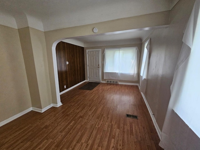 spare room with dark hardwood / wood-style flooring