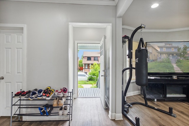 3738 Montgomery Ave, Detroit, MI 48206 - workout area with ornamental molding, wood finished floors, baseboards, and recessed lighting