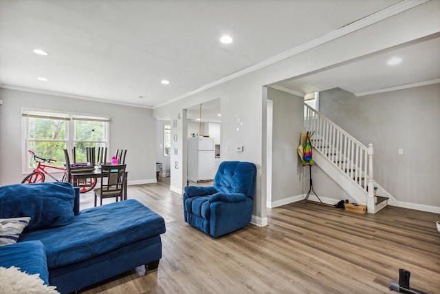 3738 Montgomery Ave, Detroit, MI 48206 - living room with wood finished floors, stairway, baseboards, ornamental molding, and recessed lighting