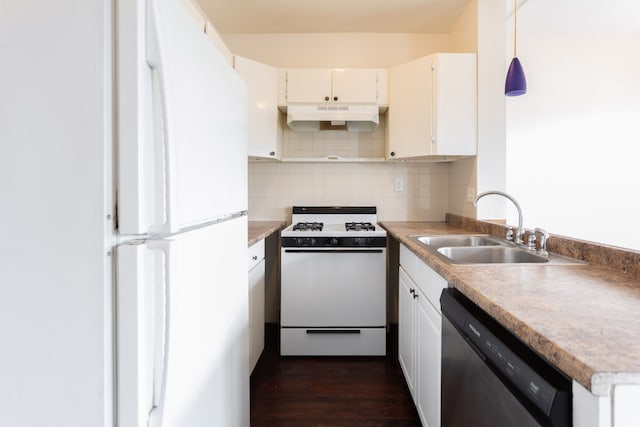 kitchen with dark hardwood / wood-style flooring, white appliances, sink, decorative light fixtures, and white cabinetry