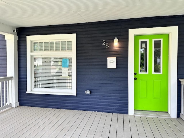 entrance to property with a porch