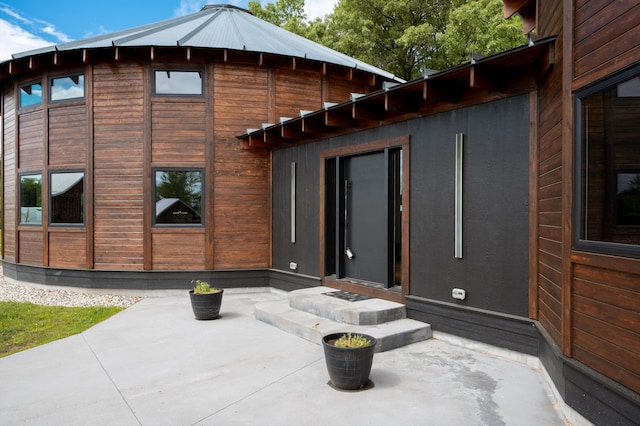 back of house featuring a patio area