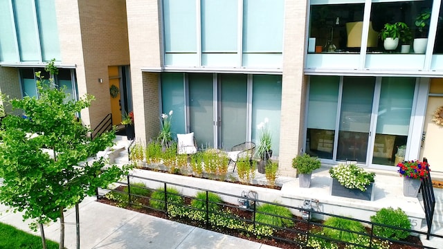 2813 Brush St Unit 99, Detroit, MI 48201 - view of exterior entry featuring brick siding
